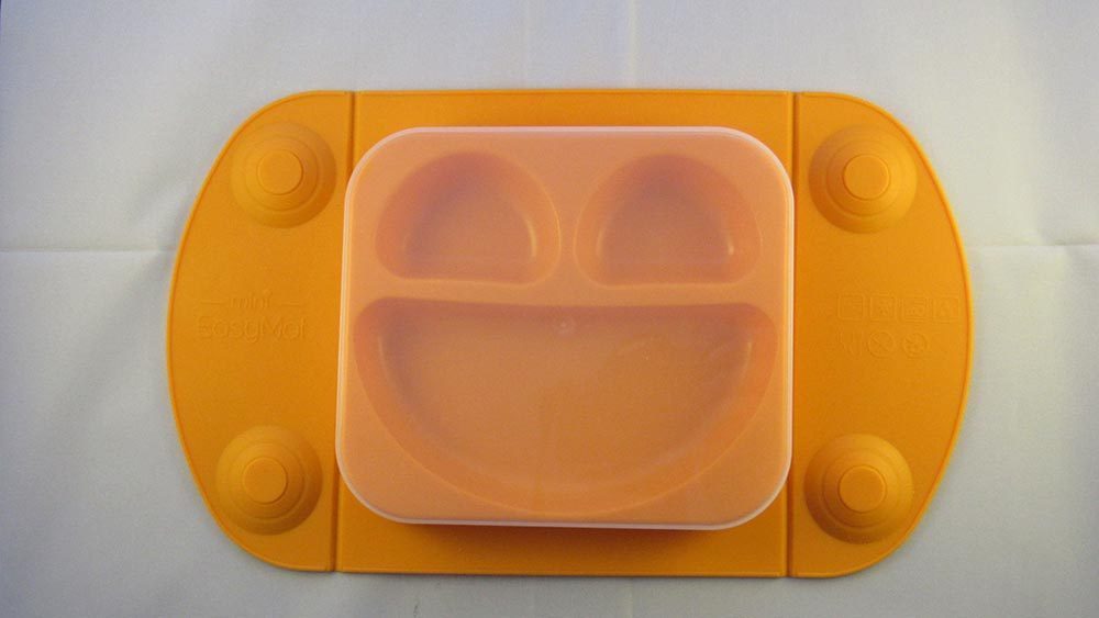 Orange suction mat against white background