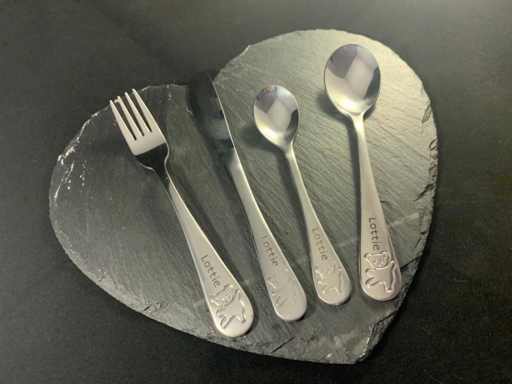 Personalised cutlery set on a heart slate